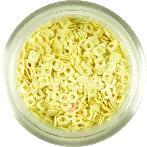 Malá ozdoba na nehty - banánově žluté čtverečky s dírkou